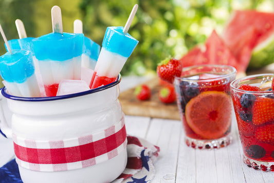 rocket pops and cups with fruit